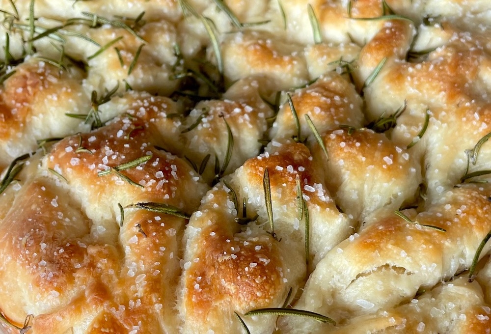 Focaccia bread recipe ingredients with step by step instructions. How to make this yummy bread at home the same day!