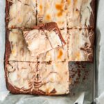 Easy store bought brownie mix swirled with a homemade cheesecake swirl. The best semi homemade dessert to make at home!