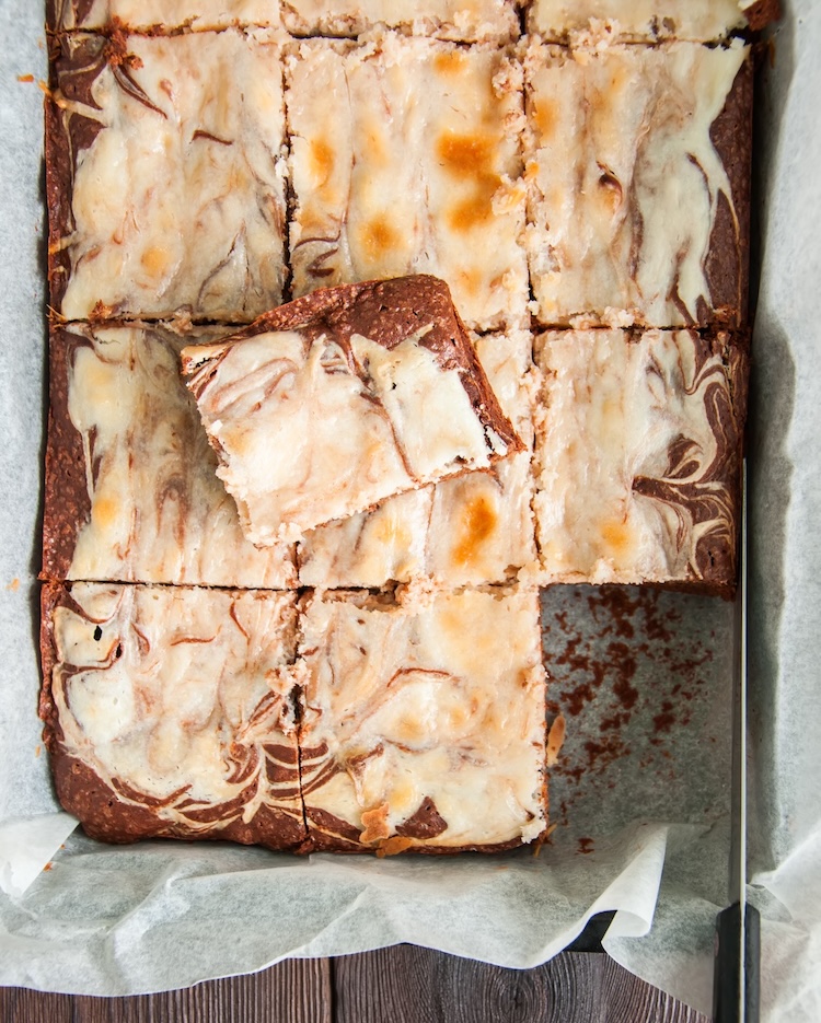 Easy store bought brownie mix swirled with a homemade cheesecake swirl. The best semi homemade dessert to make at home!