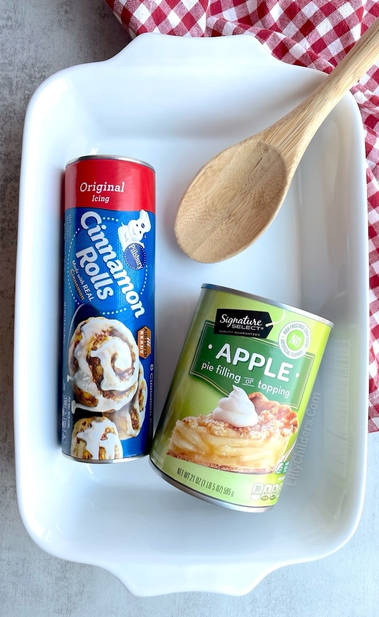 Simple holiday dessert! Try this cinnamon roll apple pie filling dessert for your next family gathering! It's so easy to make with just 2 cheap ingredients. Serve warm with vanilla ice cream and you've got an impressive and delicious dessert that crazy easy to make!